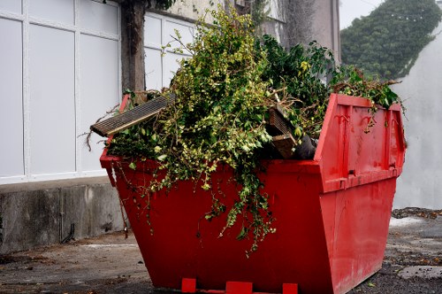 Workers sorting construction waste for recycling