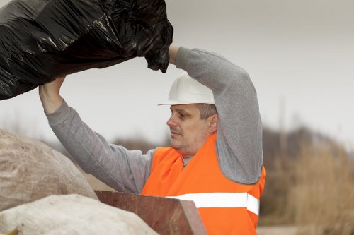 Home clearance professionals handling belongings in Penge property